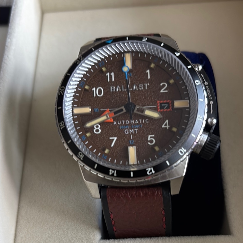 Sporty Silver and Brown Watch with Subdials and Arabic Numerals